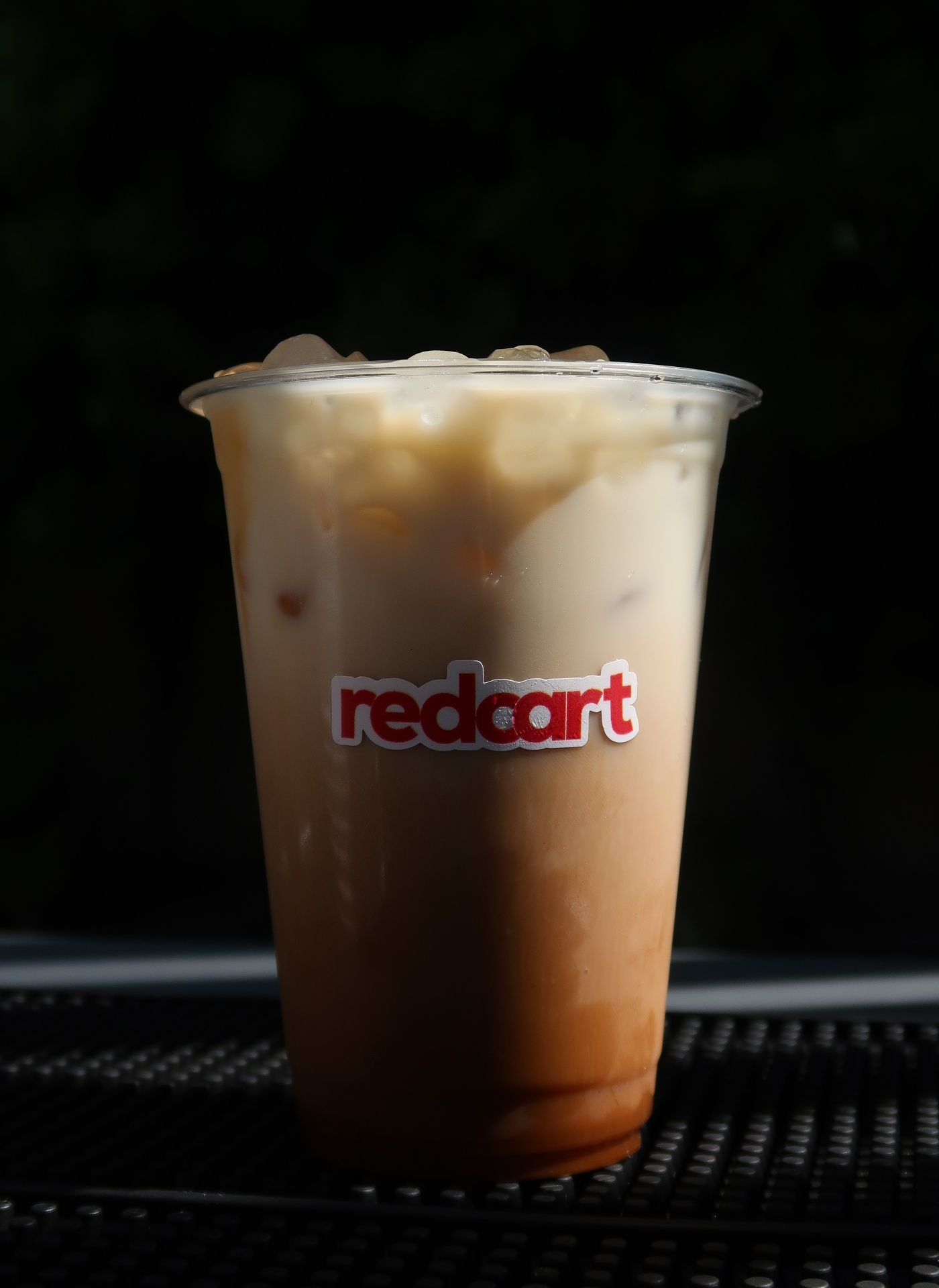 Iced specialty coffee drink served at a brand activation pop-up